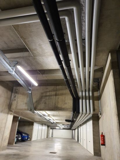 réseaux de chauffages en nappes en sous sol d' immeubles de logements à Lyon